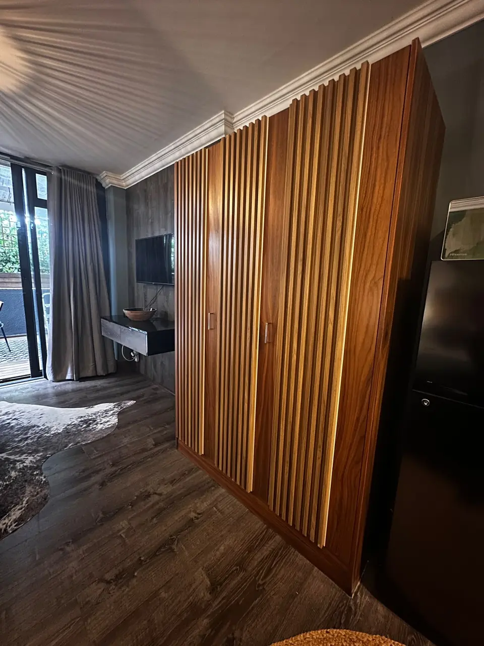 Slatted timber feature wall in a living space